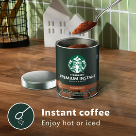 Starbucks Premium Instant Coffee tins back view, three-tin set ideal for home use.