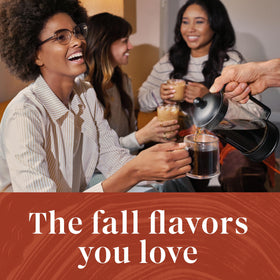 Brewing Starbucks Pumpkin Spice in a Keurig, steam rising.