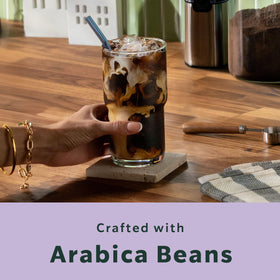 Starbucks Vanilla Lavender K-Cups paired with creamer for a personalized latte-like taste