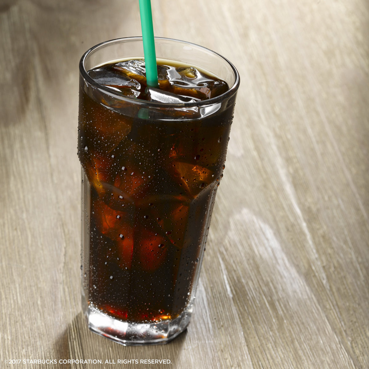 Starbucks VIA packaging emphasizes natural Arabica beans and light sweetness.
