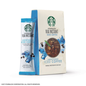 Starbucks VIA packets close-up illustrating convenient single-serve format for on-the-go mornings.