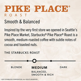 Starbucks Via instant coffee packets with travel mug, on-the-go convenience.