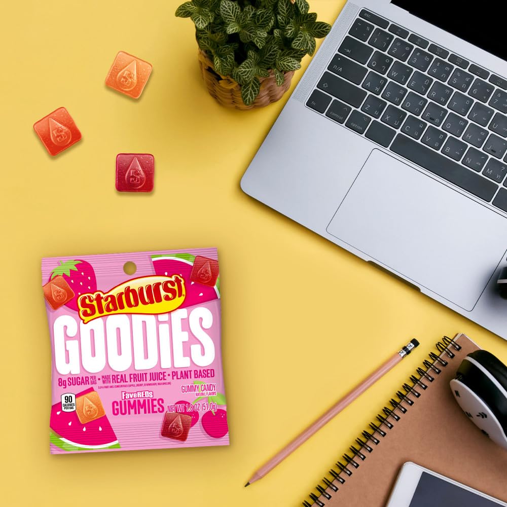 Starburst Goodies FaveREDS gummies being poured, easy snack for busy days.