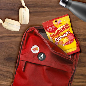 Starburst Original Gummies party favors display, perfect for celebrations.