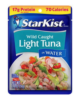 StarKist Light Tuna Water Pouch atop a salad for a quick meal.