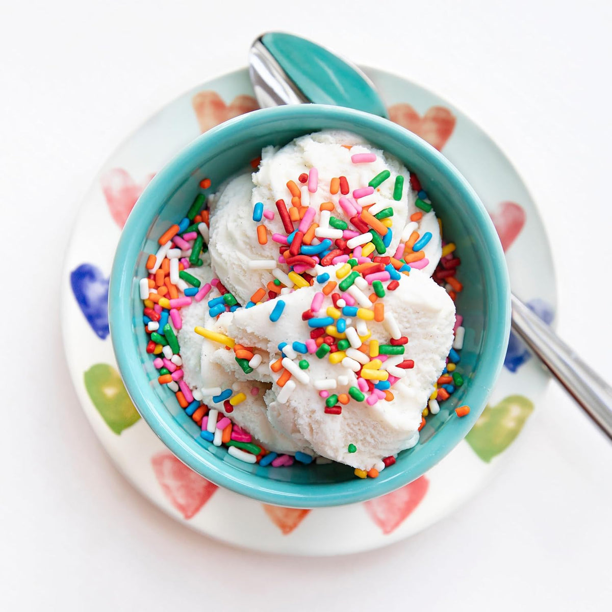 Starnest Rainbow Sprinkles on cupcake adding color and texture.