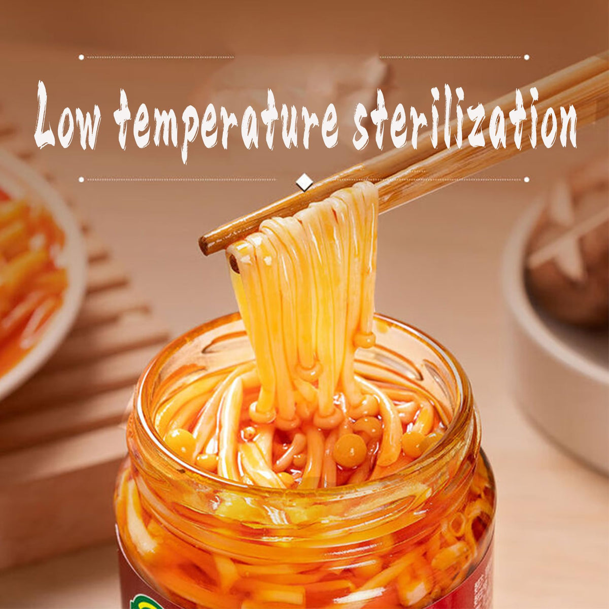 Close-up of STARTZYK Enoki Mushrooms in red oil, rich aroma and heat.