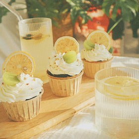 STARTZYK preserved lemon slices used as cocktail garnish.