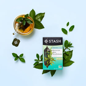 Eco friendly packaging of Stash tea with green branding