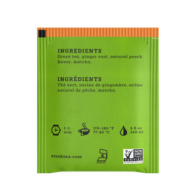 Close-up of Stash Ginger Peach Green Tea bags highlighting a fragrant blend.
