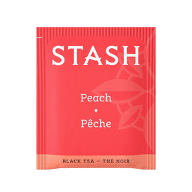 Stash tea bags fanned out showing peach flavor and premium foil packaging
