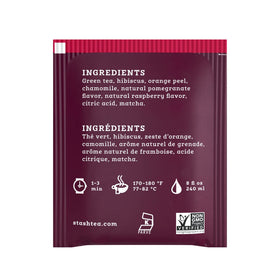 Hot cup of Stash Tea Pomegranate Raspberry Green Tea with bright aroma
