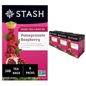 Stash Pomegranate Raspberry & Matcha tea box with cup for a refreshing brew.
