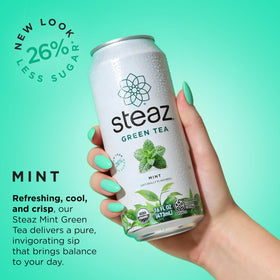 Steaz Green Tea Mint being poured into a glass with mint aroma.