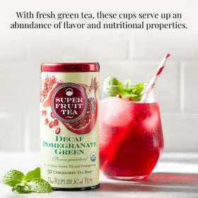 Steeping a cup of pomegranate green tea decaf for a bright, approachable flavor.