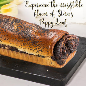Stern's Bakery freshly baked poppy seed cake on a cooling rack