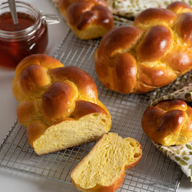Stern's Bakery braided challah loaf, premium ingredients for a flavorful centerpiece.