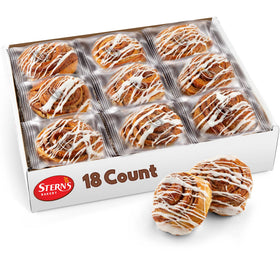 Stern’s Bakery cinnamon rolls with white icing, a creamy topping for a satisfying breakfast treat.
