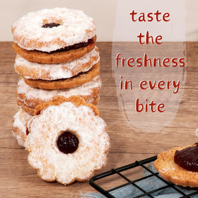 Stern's Bakery Linzer cookies in a reusable tin – keepsakes for gifting.