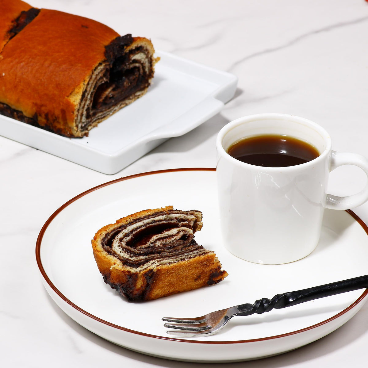 Freshly baked kokosh cake from Stern’s Bakery, ready to serve at any gathering.