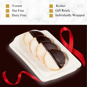 Nine cookies per box close-up showcases classic vanilla and chocolate icing