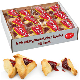 Stern’s Bakery raspberry jam shortbread cookie shows a bright fruit center, perfect for an indulgent snack.