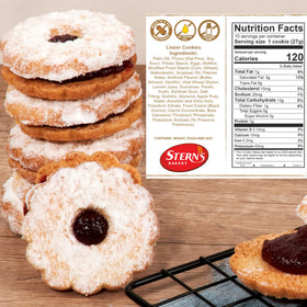 Stern’s Bakery Linzer cookie held in hand for a tasting moment