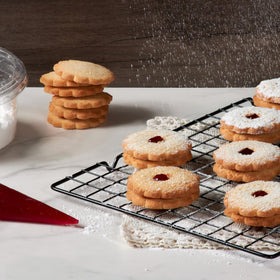 Stern's Bakery Linzer cookies texture – soft shortbread with a glossy raspberry center.