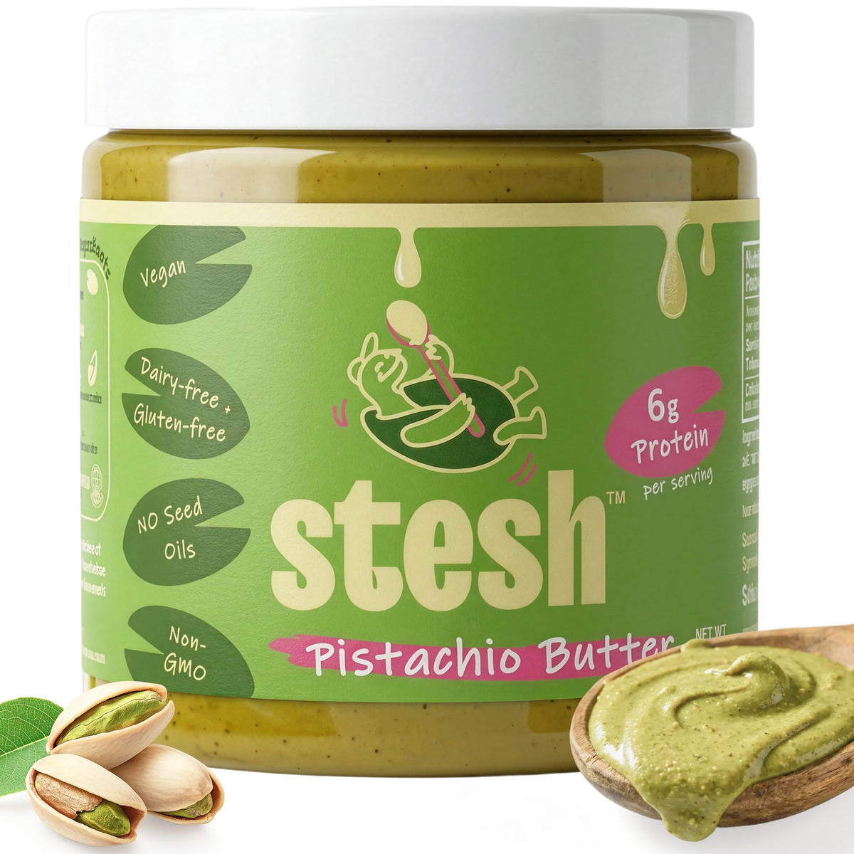 Stesh Pistachio Butter jar on countertop, creamy plant-based protein ready to spread.