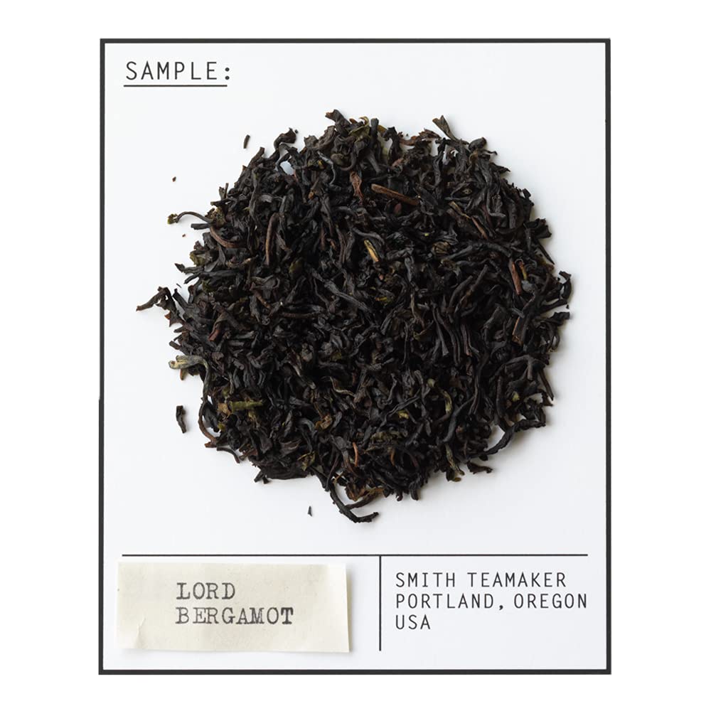 Brewing setup with Lord Bergamot Earl Grey tea steeping in a cup.