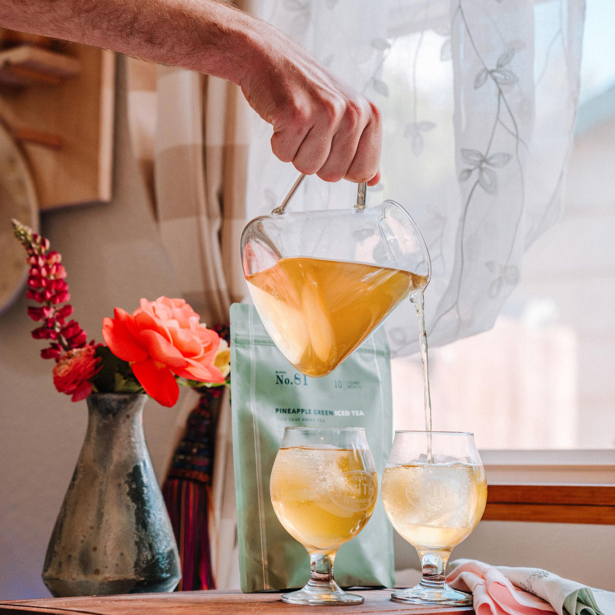 Steven Smith Teamaker Pineapple Green Iced Tea No. 81 sachets in a pitcher, perfect for entertaining.