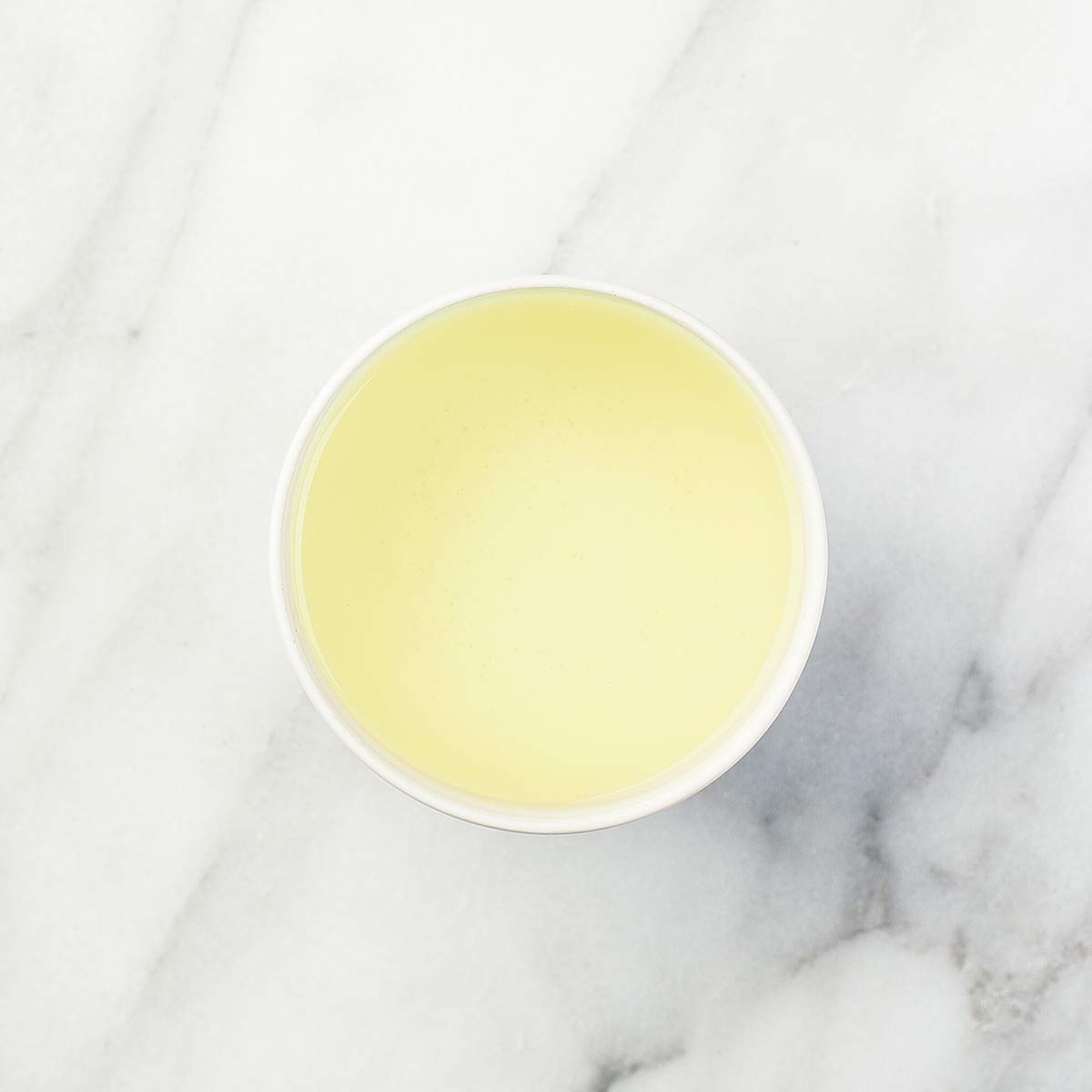 Steaming cup of Rose City Genmaicha ready to sip.