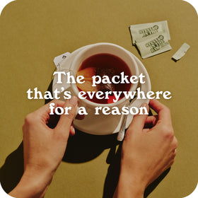 Stevia In The Raw coffee cup, sugar-free sweetness for morning brew.