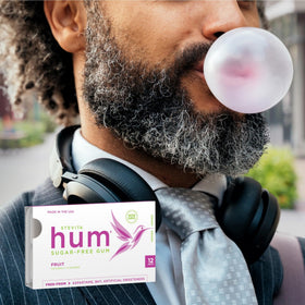 Stevita Hum Fruit gum on desk or bag for quick, tasty chew.