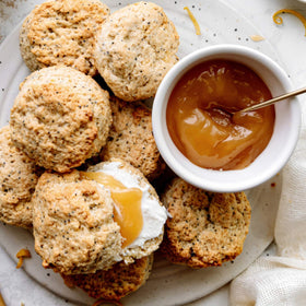 Sticky Fingers Lemon Poppyseed Scone in the oven filling the kitchen with aroma.
