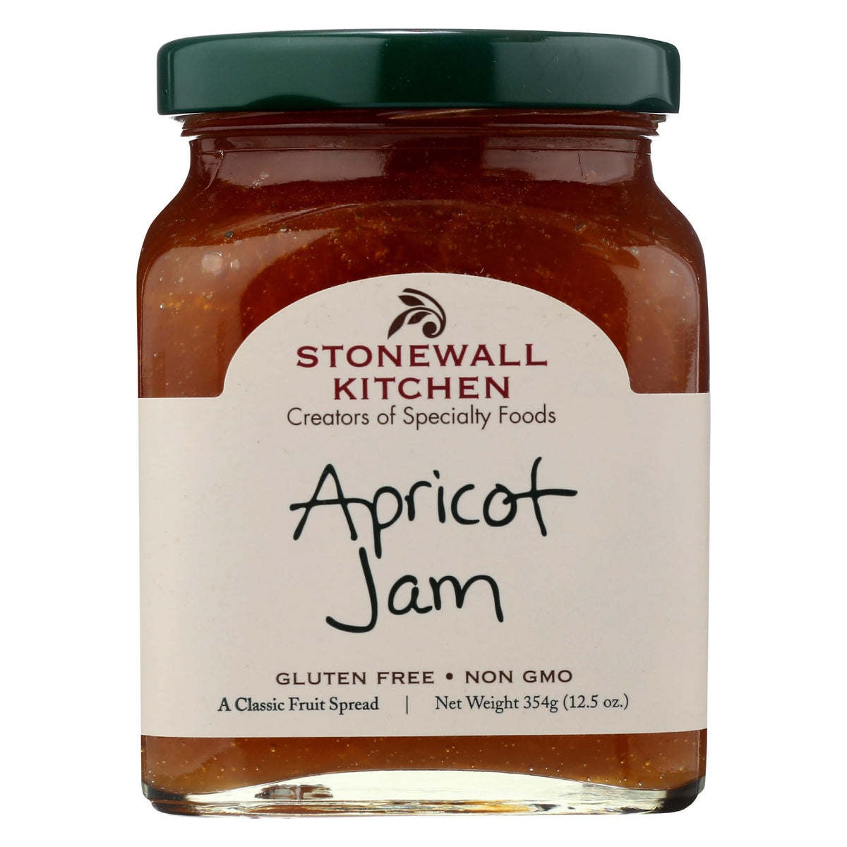 Stonewall Kitchen Apricot Jam jar on a wooden board, ready to spread on toast.