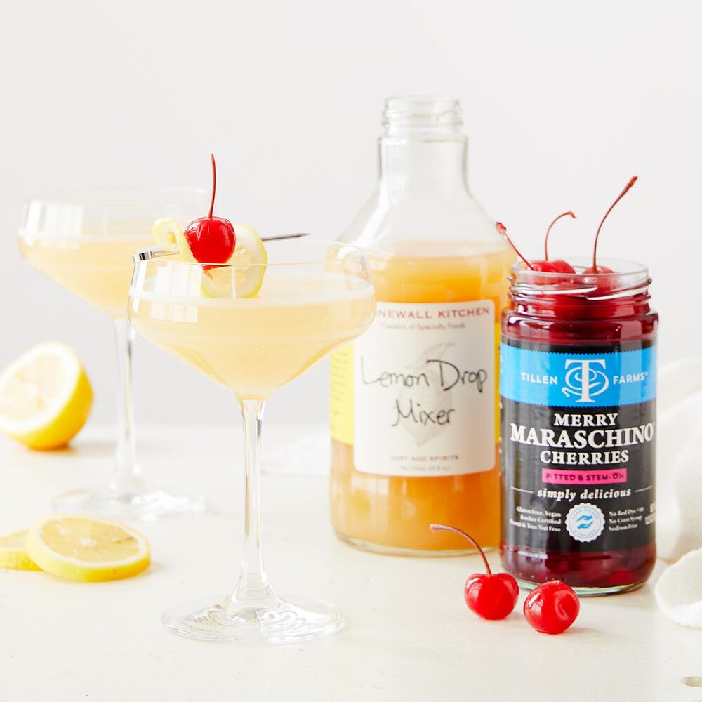 Stonewall Kitchen Lemon Drop Mixer 24oz glass beside a classic martini