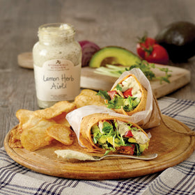 Stonewall Kitchen Lemon Herb Aioli dipping sauce with lemon and herbs.