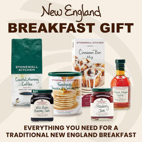 Stonewall Kitchen Maine Maple Syrup enhances pancakes with rich sweetness.