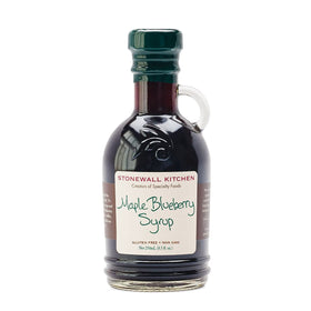 Stonewall Kitchen Maple Blueberry Syrup bottle pour over pancakes for a Maine-inspired breakfast.