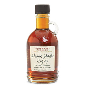 Stonewall Kitchen maple syrup close-up, premium topping for pancakes.