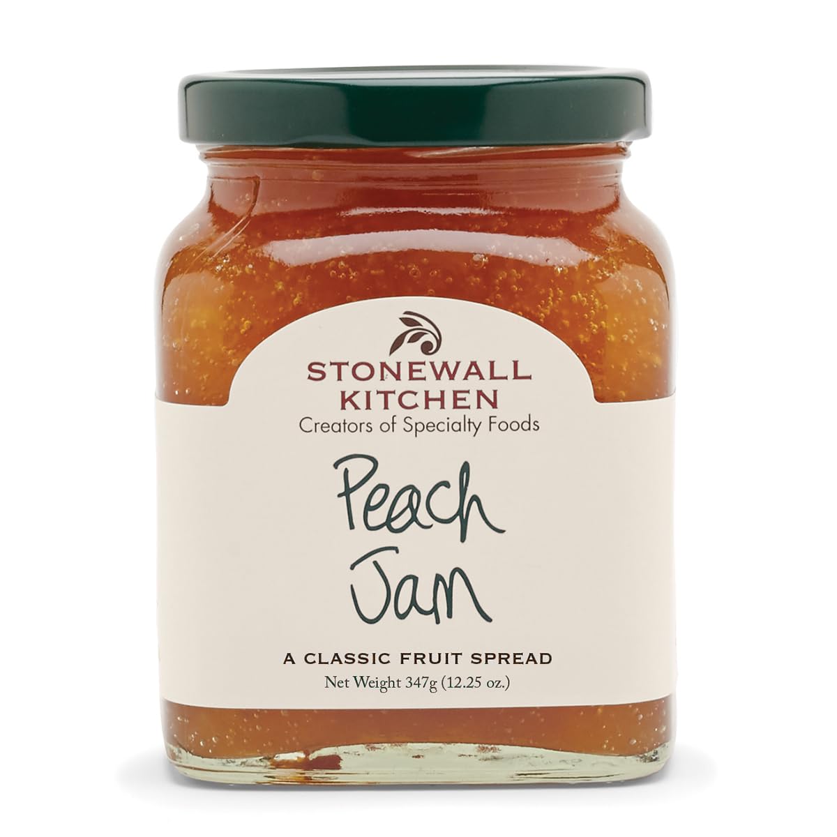 Stonewall Kitchen Peach Jam bottle with label, perfect spread for toast and pastries.