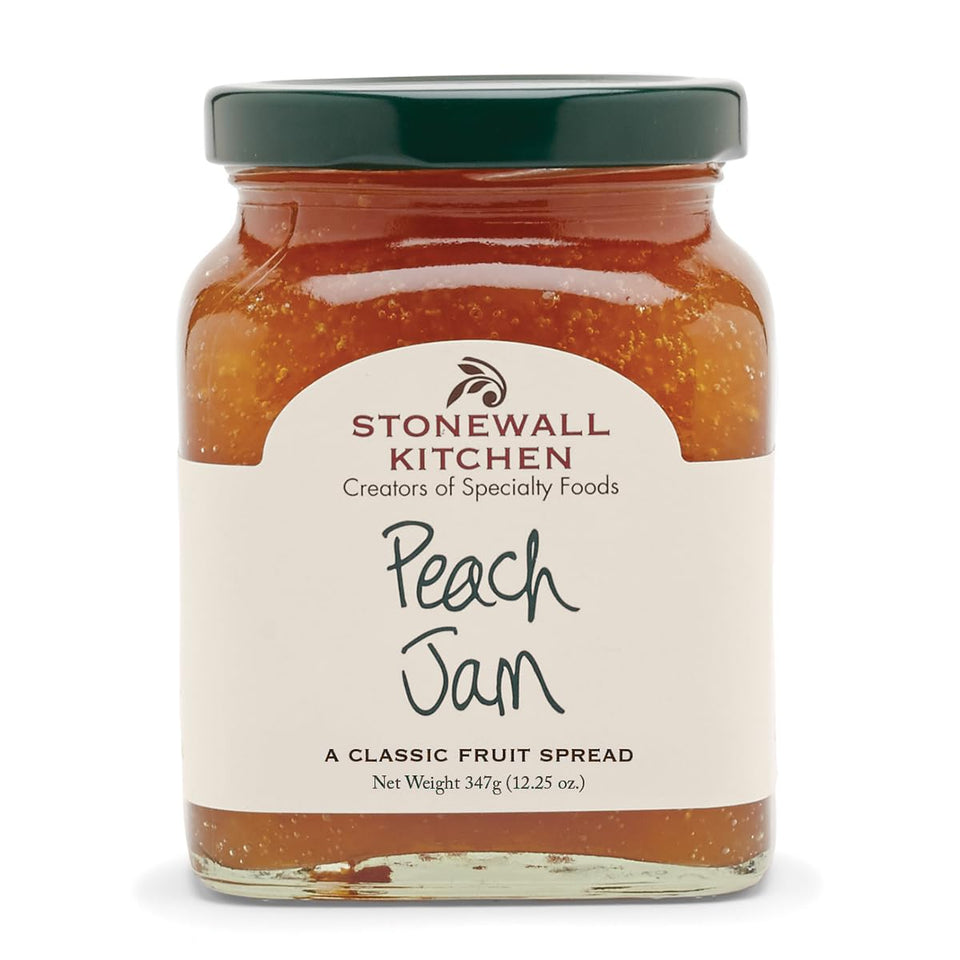 Stonewall Kitchen Peach Jam bottle with label, perfect spread for toast and pastries.