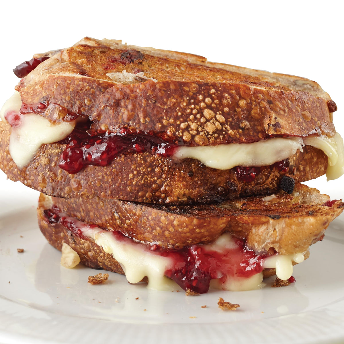 Stonewall Kitchen raspberry jam texture showing bright, tart fruit spread