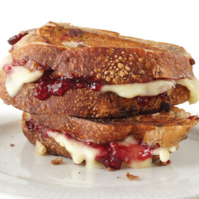 Stonewall Kitchen raspberry jam texture showing bright, tart fruit spread