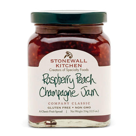 Stonewall Kitchen Raspberry Peach Champagne Jam jar enhances breakfasts with fruity sweetness.