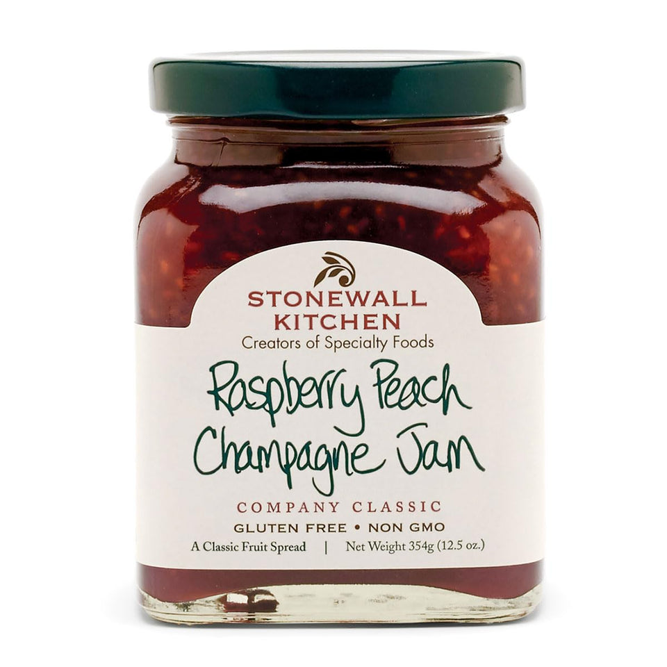 Stonewall Kitchen Raspberry Peach Champagne Jam jar enhances breakfasts with fruity sweetness.