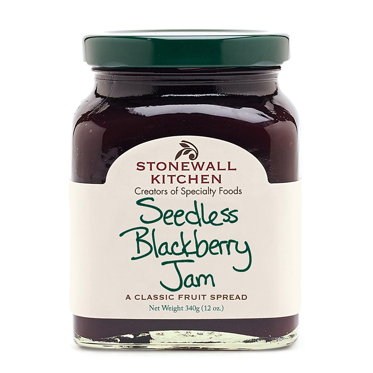 Stonewall Kitchen Seedless Blackberry Jam bottle on breakfast table, ideal for toast.