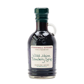 Stonewall Kitchen syrup bottle label detail helps shoppers identify flavor at a glance.