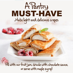 Dessert crepes with chocolate and strawberries ready to serve.